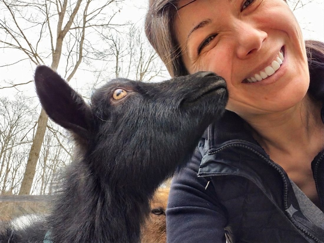 Aïko Thurlow with an animal